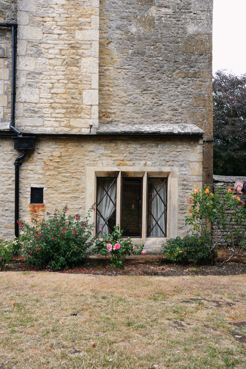 A cottage window and wall