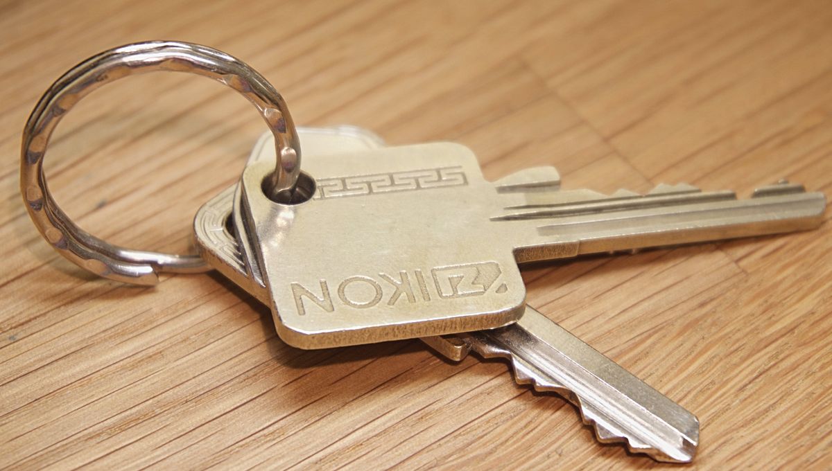 House keys on a wooden surface